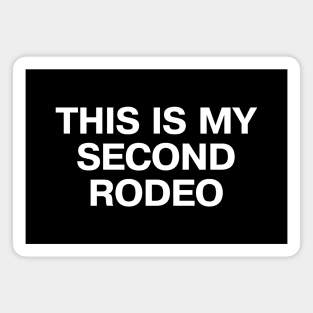 "THIS IS MY SECOND RODEO" in plain white all caps letters - cos you're not the noob, but barely Magnet